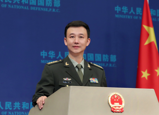 国防部现任发言人，展现新时代国防力量的声音，国防新声，发言人揭示新时代国防力量风采